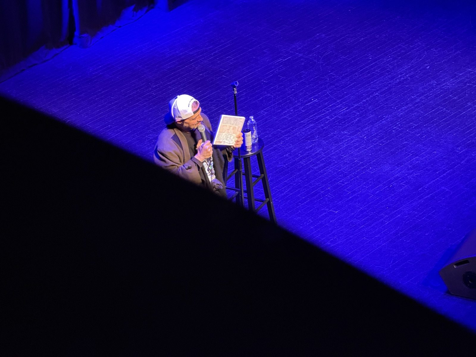 Kevin Smith on stage at the Fitzgerald Theater, seen from a box above the stage